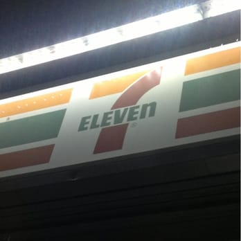 7-Eleven - a 7 - eleven sign lit up at night - Convenience Stores Near Me - Orange, California
