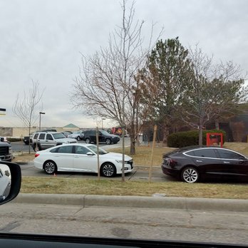 Slim Chickens - Drive thru cars wrapped around the building - Chicken Wings Near Me - Centennial, Colorado