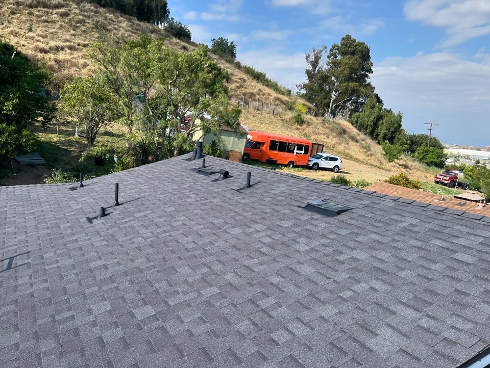 Slide of Straw Hat Roofers