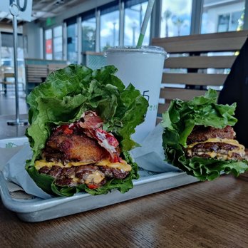 Shake Shack Encino Courtyard - Double smoke shack with a fried portobello, lettuce wrapped. - Burgers Near Me - Encino, California Shake Shack Encino Courtyard - Double smoke shack with a fried portobello, lettuce wrapped. - Burgers Near Me - Encino, California