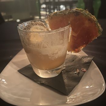 J.T. Prime - Yuma - Toasted Coconut/pineapple ice cream and house fermented Tepacag float. - Cocktail Bars Near Me - Yuma, Arizona J.T. Prime - Yuma - Toasted Coconut/pineapple ice cream and house fermented Tepacag float. - Cocktail Bars Near Me - Yuma, Arizona