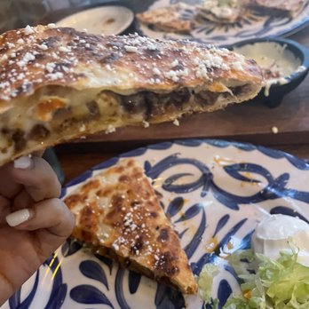 F&D Cantina - Fully packed quesadilla with the perfect crisp - Mexican Near Me - Orlando, Florida F&D Cantina - Fully packed quesadilla with the perfect crisp - Mexican Near Me - Orlando, Florida