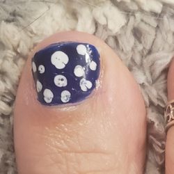 The Nail Shop - Crack on edge of left side. Paint looks awful
