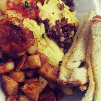 Francesca's On Pawtucket - Corned beef hash omelette with some salsa - American Near Me - Pawtucket, Rhode Island Francesca's On Pawtucket - Corned beef hash omelette with some salsa - American Near Me - Pawtucket, Rhode Island