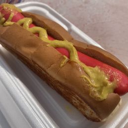 a hot dog with mustard and ketchup
