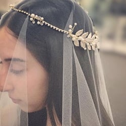 Drop veil and halo look. Available at Mazdos bridal