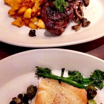 The Henry - Life does not get much better than this NY strip accompanied by the Chilean sea bass - New American Near Me - Phoenix, Arizona