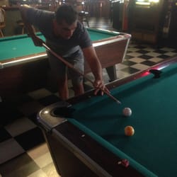 Lots of pool tables, a buck a game!