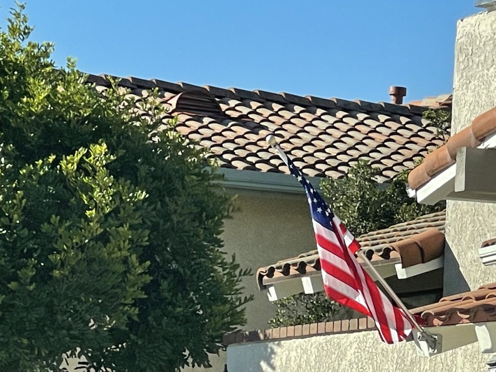 Slide of MRK Roofing Services