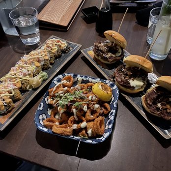 Thrive - Fried and gone to heaven sushi roll, calamari, and impossible truffle bag boys sliders - Cocktail Bars Near Me - Orlando, Florida Thrive - Fried and gone to heaven sushi roll, calamari, and impossible truffle bag boys sliders - Cocktail Bars Near Me - Orlando, Florida
