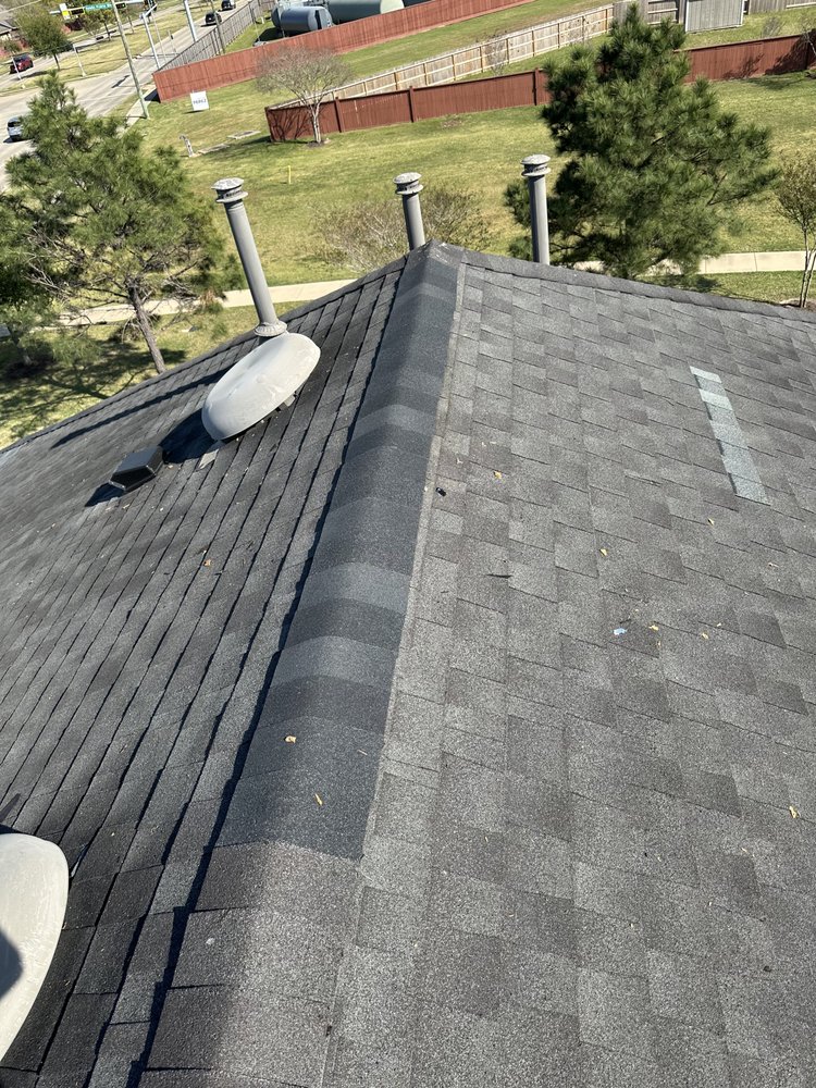 Slide of Redeemer Roofing