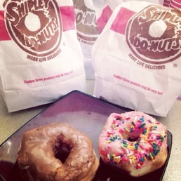two doughnuts with sprinkles two doughnuts with sprinkles