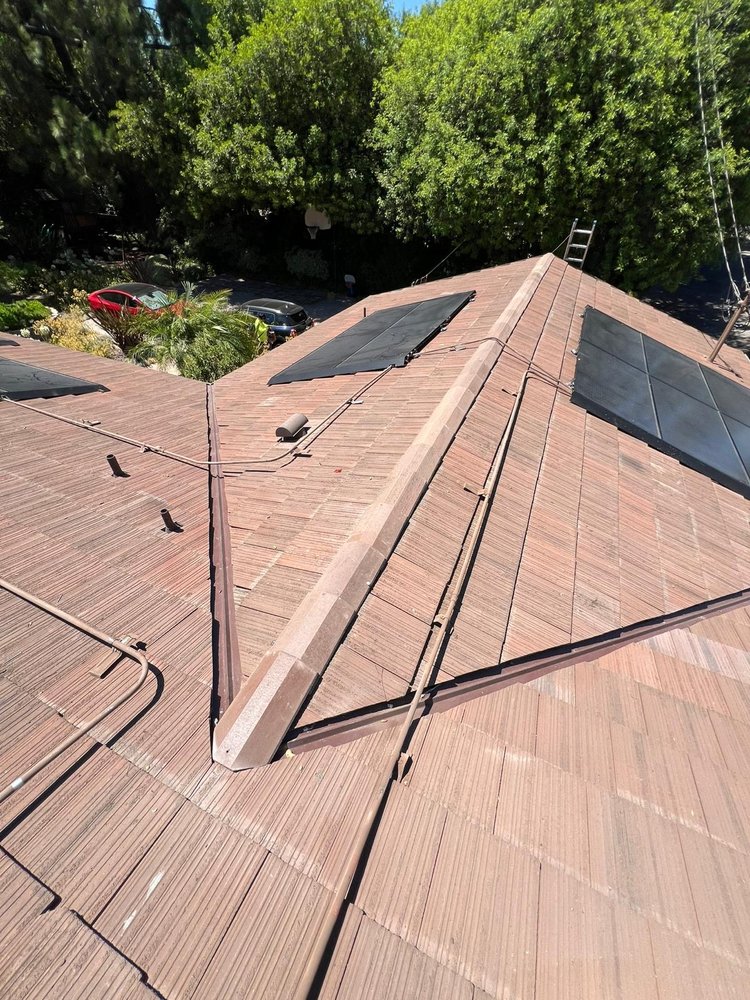 Slide of R Squared Roofing Services