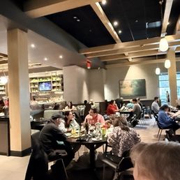 Dining room. Bar to left. Dining room. Bar to left.