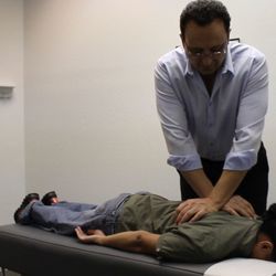 First Chiropractic - Gilroy CA Back Pain Specialists - Dr. Sam performs back adjustment therapy. First Chiropractic 408-848-6222
