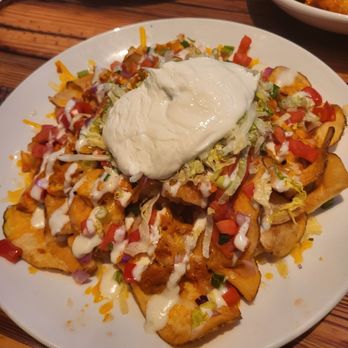 Miller's Ale House - Chicken nachos Zing promo. Yummy! - Sports Bars Near Me - Sharpsburg, Georgia Miller's Ale House - Chicken nachos Zing promo. Yummy! - Sports Bars Near Me - Sharpsburg, Georgia
