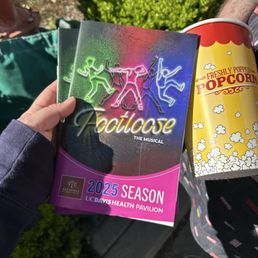 Footloose Playbill and popcorn bucket from Broadway Sacramento Music Circus