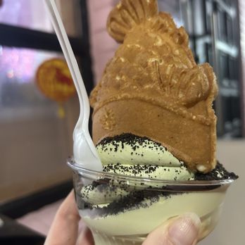 Omg Squee - Honey matcha soft serve dusted with Oreo. - Desserts Near Me - Austin, Texas