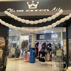 The Blessed Life - Store entrance 2nd floor, above center stabe