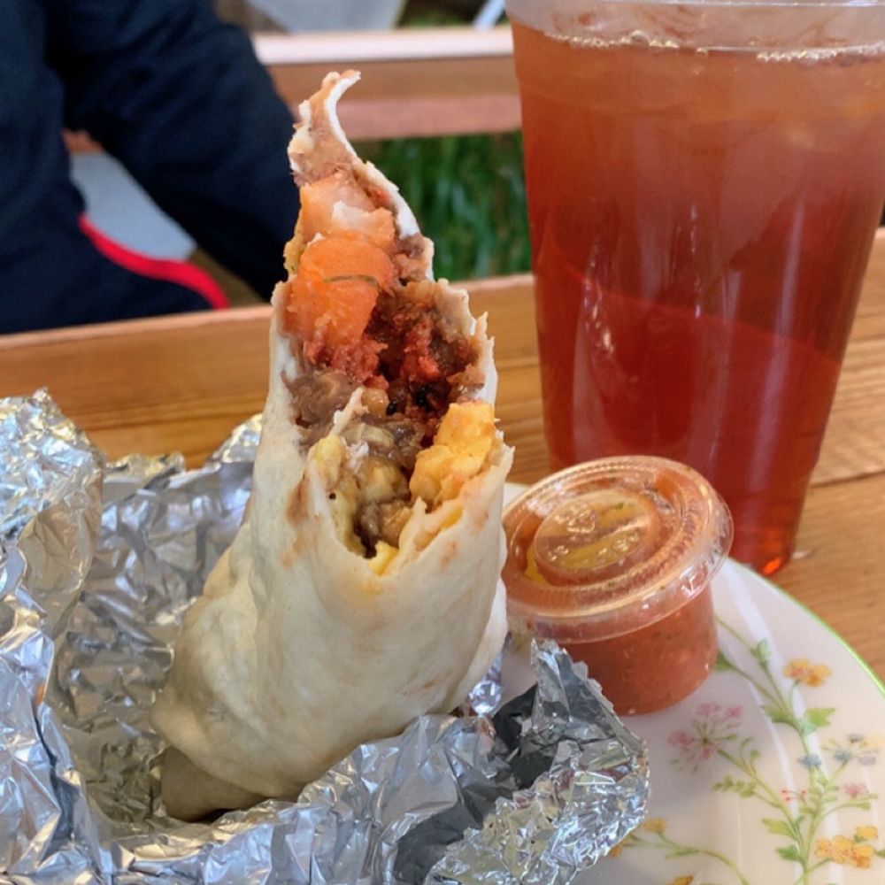 Windmill KC Coffeehouse - The inside of the chorizo burrito and a black tea with raspberry syrup - Cafes Near Me - Kansas City, Kansas Windmill KC Coffeehouse - The inside of the chorizo burrito and a black tea with raspberry syrup - Cafes Near Me - Kansas City, Kansas