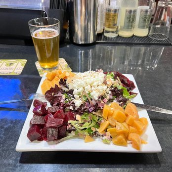 Hop DeVine - a plate of salad and a glass of beer - New American Near Me - Livermore, California