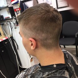 Off The Top Unisex Styling Shop