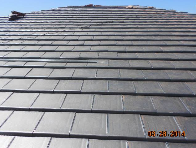Slide of Progressive Roofing