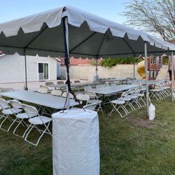 A La Fiesta - Set up day before. They don't set up the tables/chairs, but they do set up the canopy/barrels/lights
