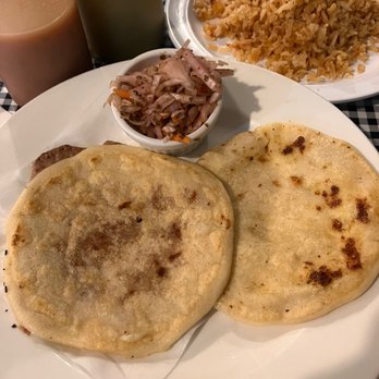 Sophie's Tacos - Two pupusas with a side of rice. Pupusas are delicious, the loroco is great, and accompanying salsas add to it. - Tacos Near Me - Seattle, Washington