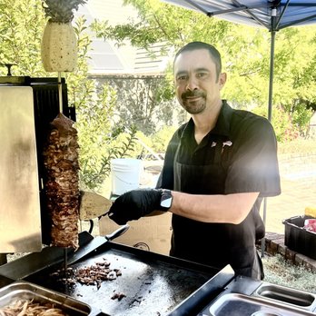 Tacos Trujillo - Jose hard at work always with a smile making is amazing street tacos. - Caterers Near Me Tacos Trujillo - Jose hard at work always with a smile making is amazing street tacos. - Caterers Near Me