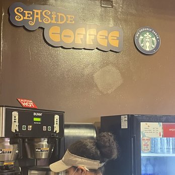 Seaside Coffee - a woman working at a coffee machine - Coffee & Tea Near Me - Orlando, Florida Seaside Coffee - a woman working at a coffee machine - Coffee & Tea Near Me - Orlando, Florida