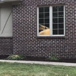 Cleaned out old rocks, old weed barrier, removed two trees. Laid new weed barrier and mulch for a clean look. Cleaned out old rocks, old weed barrier, removed two trees. Laid new weed barrier and mulch for a clean look.