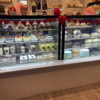 Santia’s Bakery - a display of cakes and pastries - Desserts Near Me - Jamaica Plain, Massachusetts