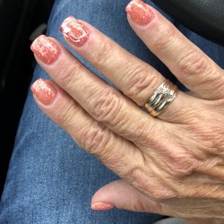 Deluxe Nails and Spa - She even added a cute detail on both ring fingers.