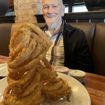 Cheddar's Scratch Kitchen - My father and I always enjoy the Onion Ring Tower appetizer! - American Near Me - Irving, Texas Cheddar's Scratch Kitchen - My father and I always enjoy the Onion Ring Tower appetizer! - American Near Me - Irving, Texas