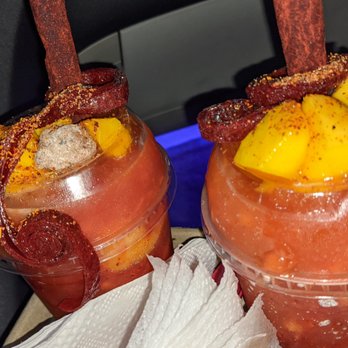 Mangos - two glasses of bloody drink in a car - Juice Bars & Smoothies Near Me - Coachella, California Mangos - two glasses of bloody drink in a car - Juice Bars & Smoothies Near Me - Coachella, California