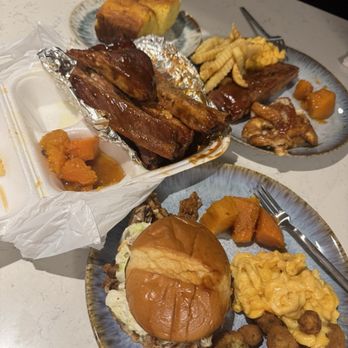 Rib Shack Smoke House - Pulled Pork Jammin Sandwich; Half of Slab St.Louis Ribs Dinner; Mac n Cheese; Fried Okra; Piece of Corn Bread; Yams; Seasoned Fries - Barbeque Near Me - Omaha, Nebraska
