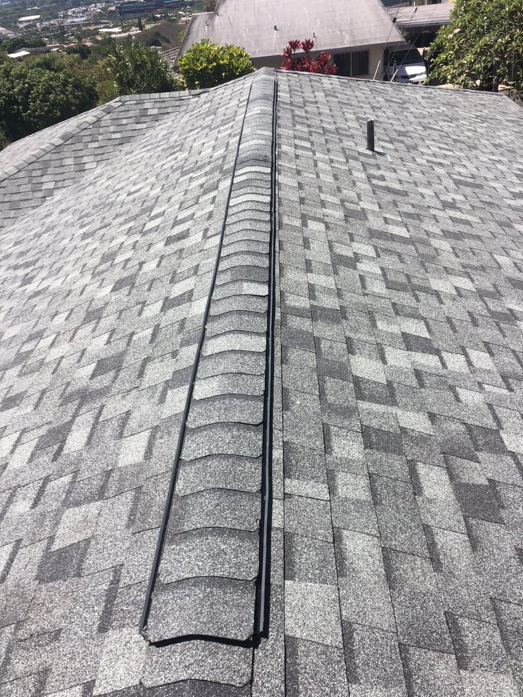Slide of New Era Roofing