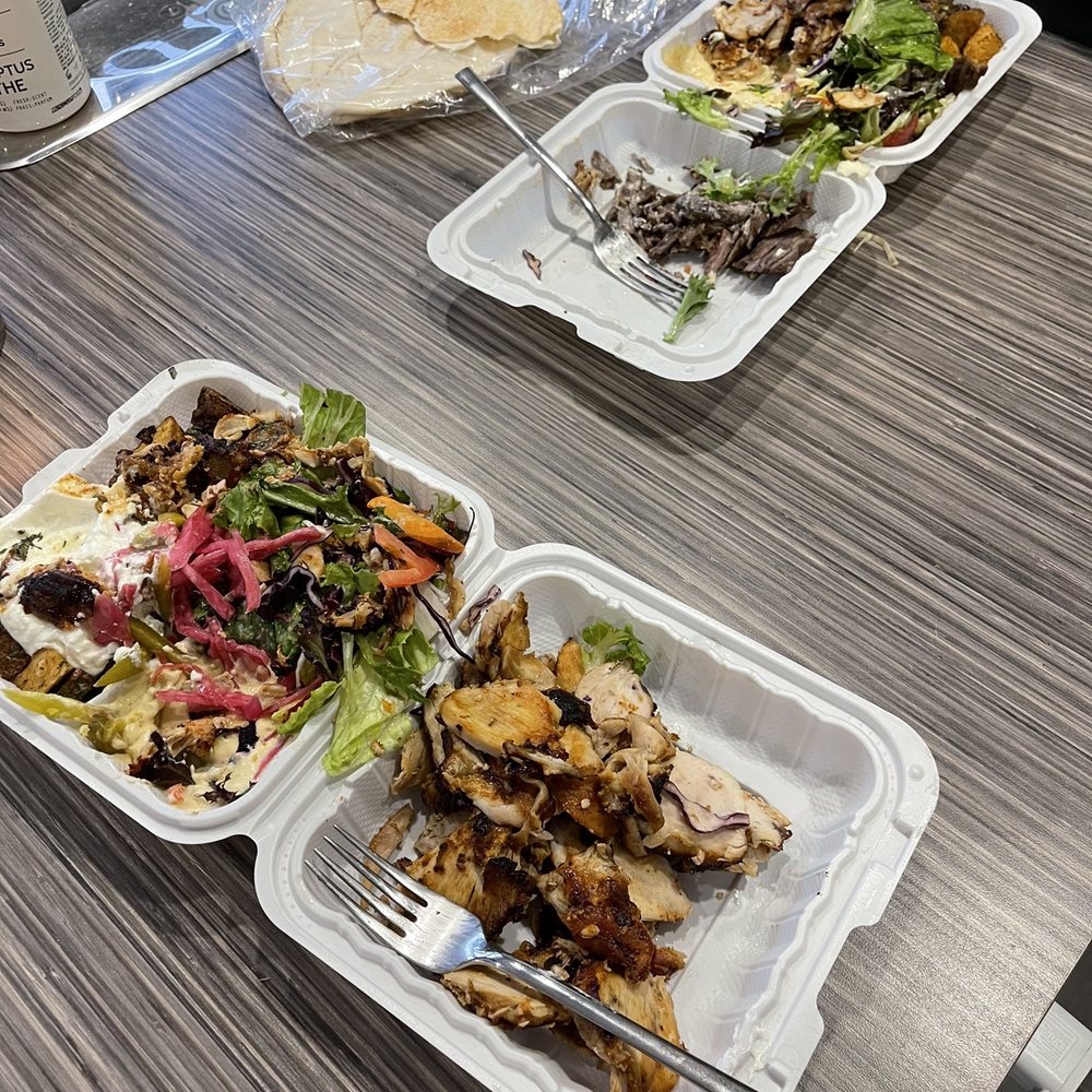 Shawarma Palace - a table with a variety of food items - Mediterranean Near Me - Ottawa, Ontario Shawarma Palace - a table with a variety of food items - Mediterranean Near Me - Ottawa, Ontario