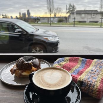 Cup & Bun Cafe - This breakfast sandwich was sooooooooo delicious! Latte was on the spot too! - Coffee & Tea Near Me - Burnaby, British Columbia