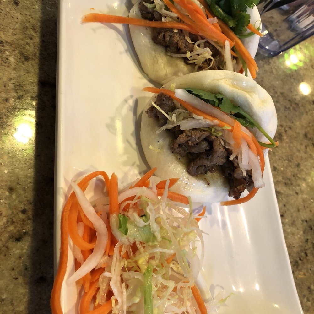 Saigon Cafe Millburn - Beef pao with pickled carrots and shredded lettuce served to hoisen sauce, yummy! - Vietnamese Near Me - Millburn, New Jersey Saigon Cafe Millburn - Beef pao with pickled carrots and shredded lettuce served to hoisen sauce, yummy! - Vietnamese Near Me - Millburn, New Jersey