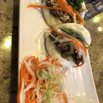 Saigon Cafe Millburn - Beef pao with pickled carrots and shredded lettuce served to hoisen sauce, yummy! - Vietnamese Near Me - Millburn, New Jersey Saigon Cafe Millburn - Beef pao with pickled carrots and shredded lettuce served to hoisen sauce, yummy! - Vietnamese Near Me - Millburn, New Jersey