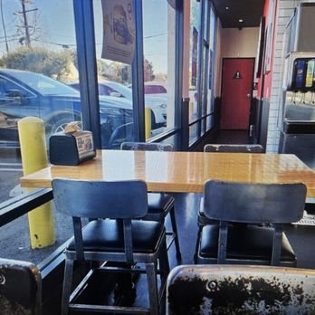 Fatburger & Buffalo's Express - interior. Bathrooms in the back. - Burgers Near Me - Valley Village, California