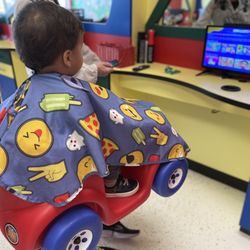 Cookie Cutters Haircuts for Kids Frisco-Little Elm, TX - Playing kid friendly video before starting on haircut