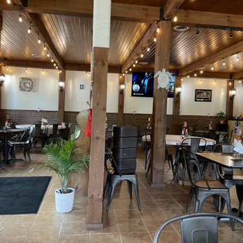 Carlotta - the inside of a restaurant with tables and chairs - Mexican Near Me - Goshen, Indiana Carlotta - the inside of a restaurant with tables and chairs - Mexican Near Me - Goshen, Indiana