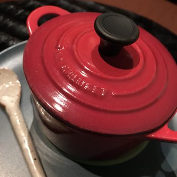 Wakuriya - Alaskan black cod and shrimp with lotus root and zucchini served in mini Le Creuset cast iron serving dish. - Japanese Near Me - San Mateo, California