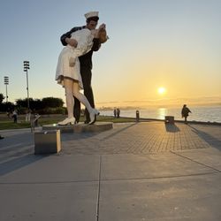 Unconditional Surrender Statue -  Embracing Peace - Statue at sunset
