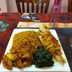 Fanta international African restaurant - Fried Snapper, Jollof Rice, Fried Plaintains, and Spinach