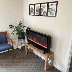 Ginkgo Tree Oriental Clinic - Waiting area with comfortable fire place