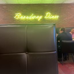 Seated at the last booth in front that famous neon sign!! Seated at the last booth in front that famous neon sign!!